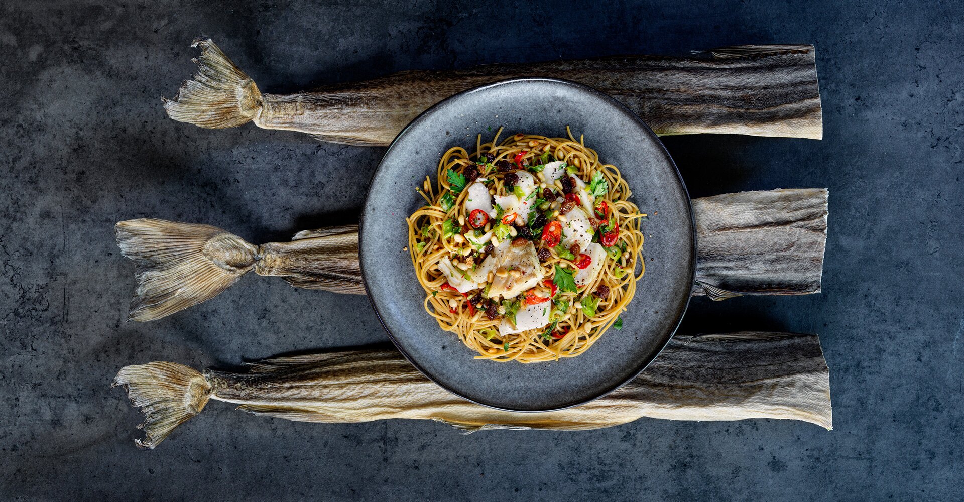 Spaghetti alla chitarra with Norwegian Stockfish, chili, raisins and pine nuts