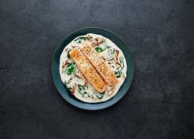 Norwegian salmon with creamy tuscan sauce